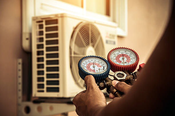 Professional Air Conditioning Service technician working in Corbin, KY